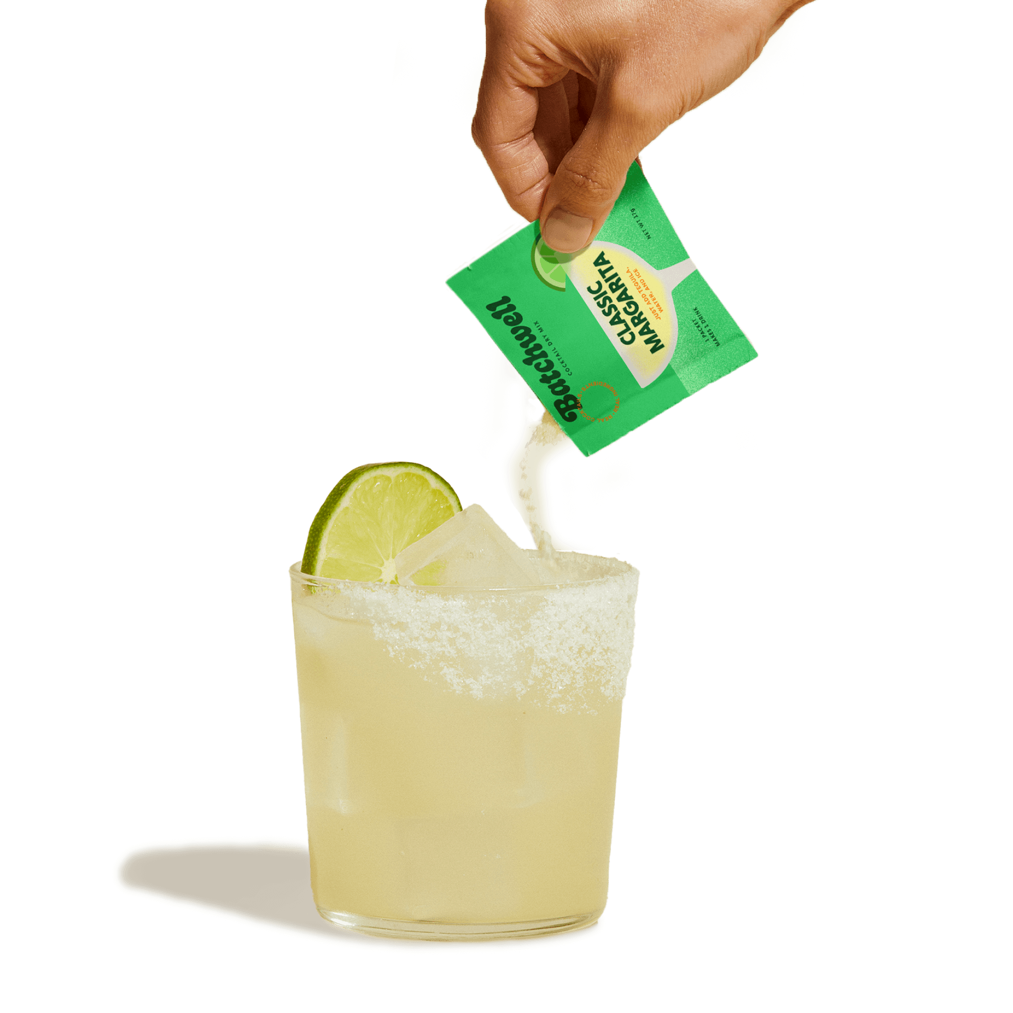 Hand pouring a classic margarita mix packet